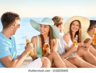 friends-drinking-beer-on-sea-260nw-1518250445.webp